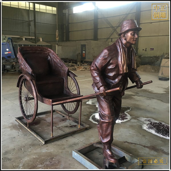 2拉車人物景觀雕塑.jpg